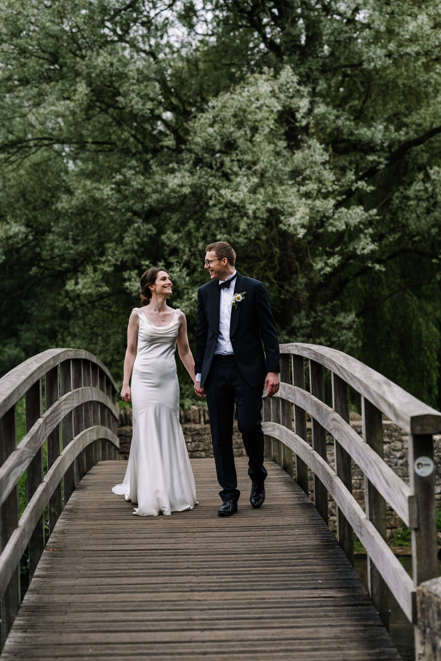 SUMMER WEDDING AT THE SWAN HOTEL BIBURY 45 Bibury wedding portrait of bride and groom