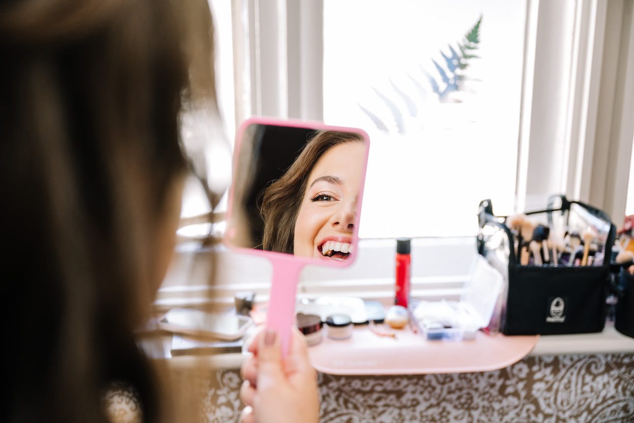 bride looking in the mirror