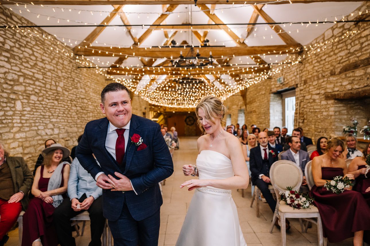 Wedding ceremony in a rustic venue.