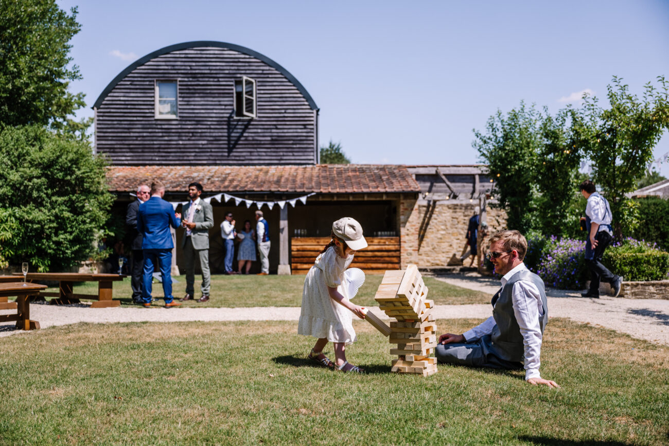 guests playing jenga at a wedding