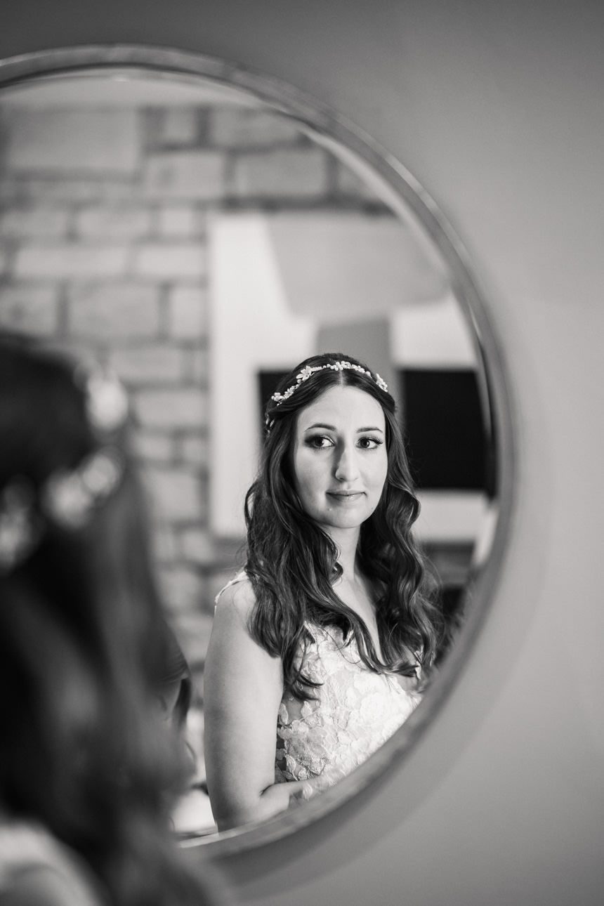 bride looking in the mirror