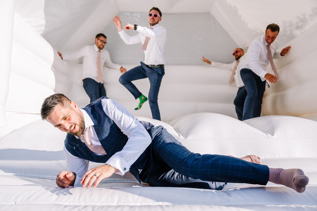 groom on bouncy castle great tythe barn