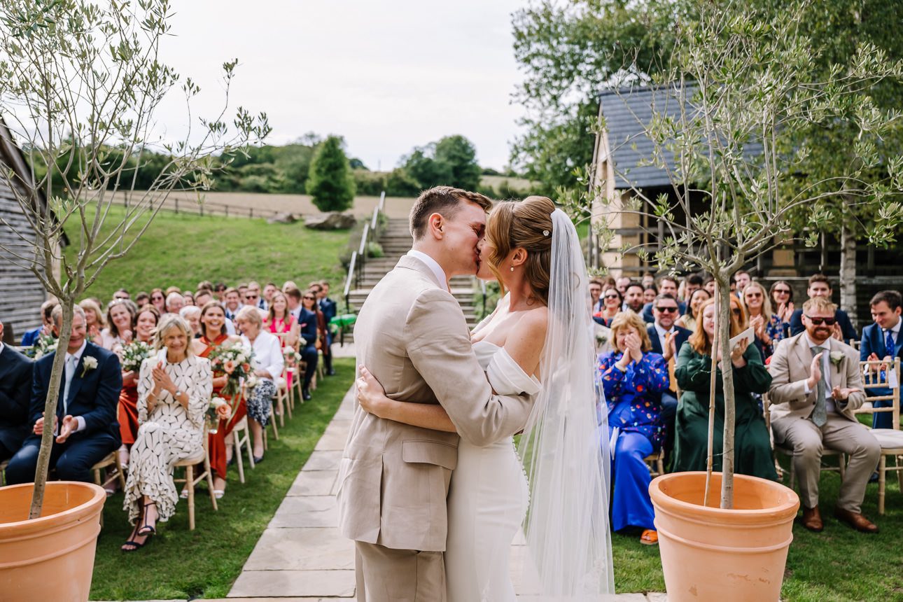 Upcote Barn wedding first kiss