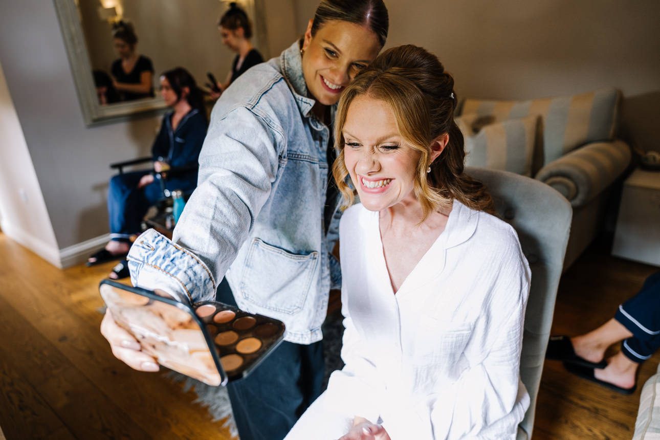 bride getting ready at the Barn at Upcote