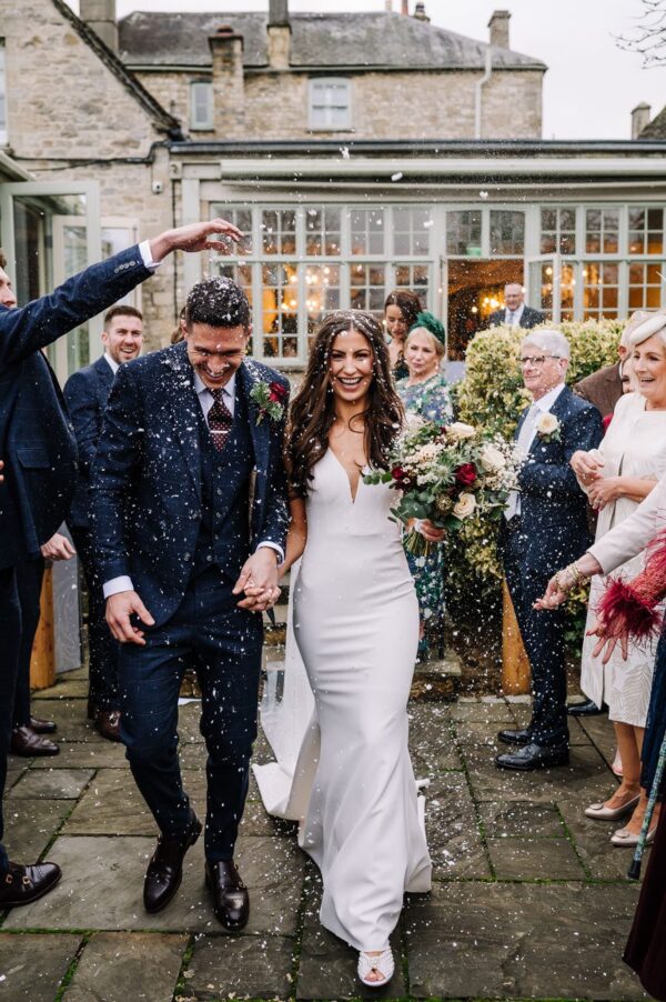 HOME 15 Confetti photograph of happy couple just getting married