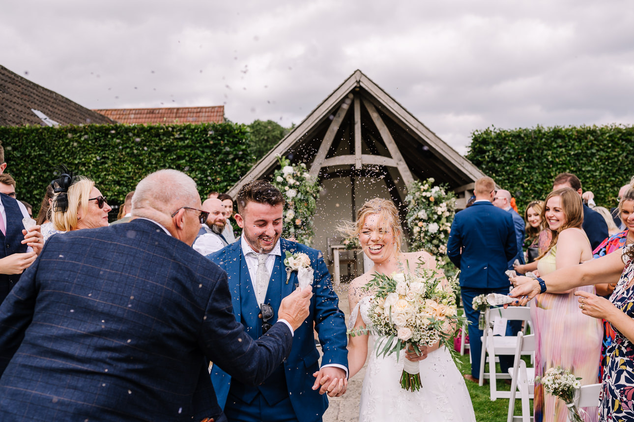 Kingscote Barn outdoor wedding ceremony