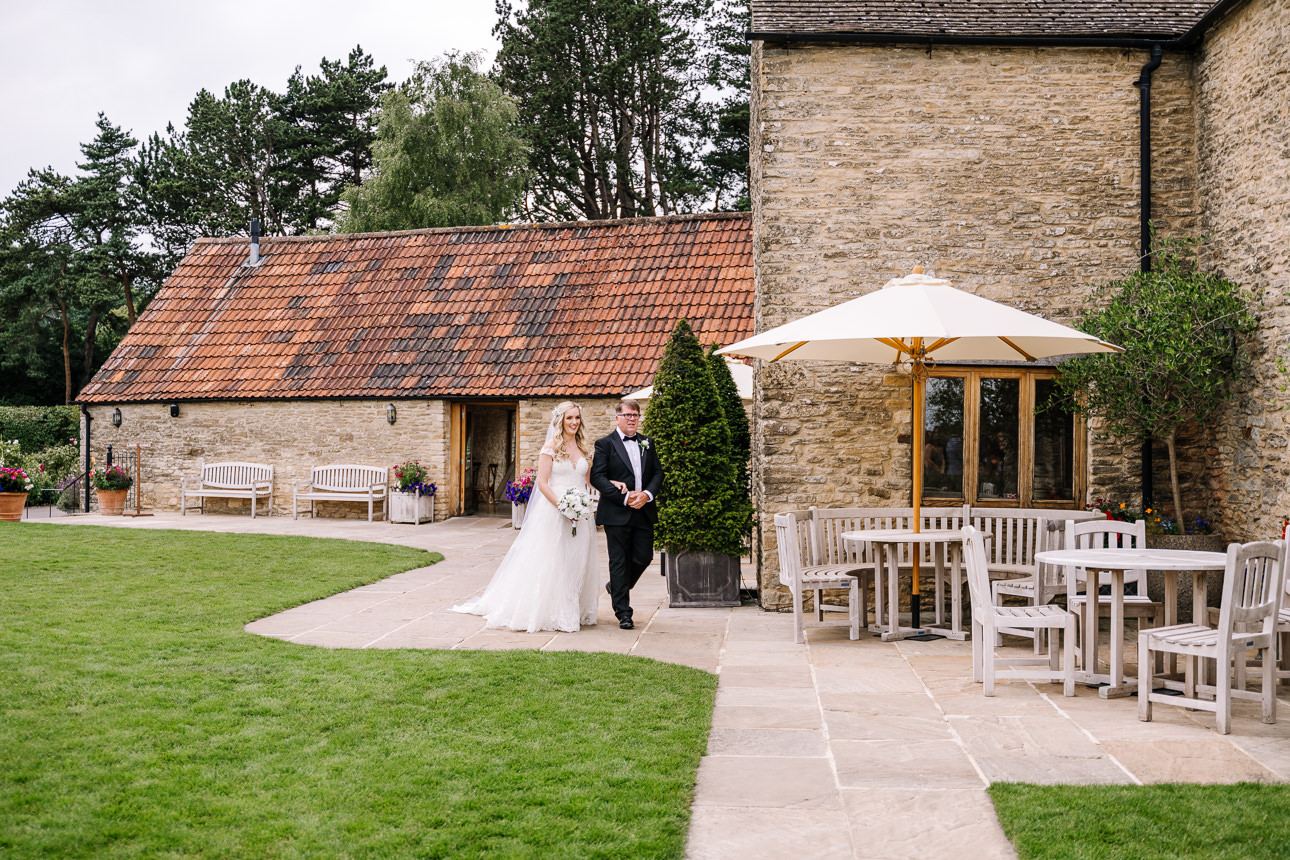 Kingscote Barn outdoor wedding ceremony