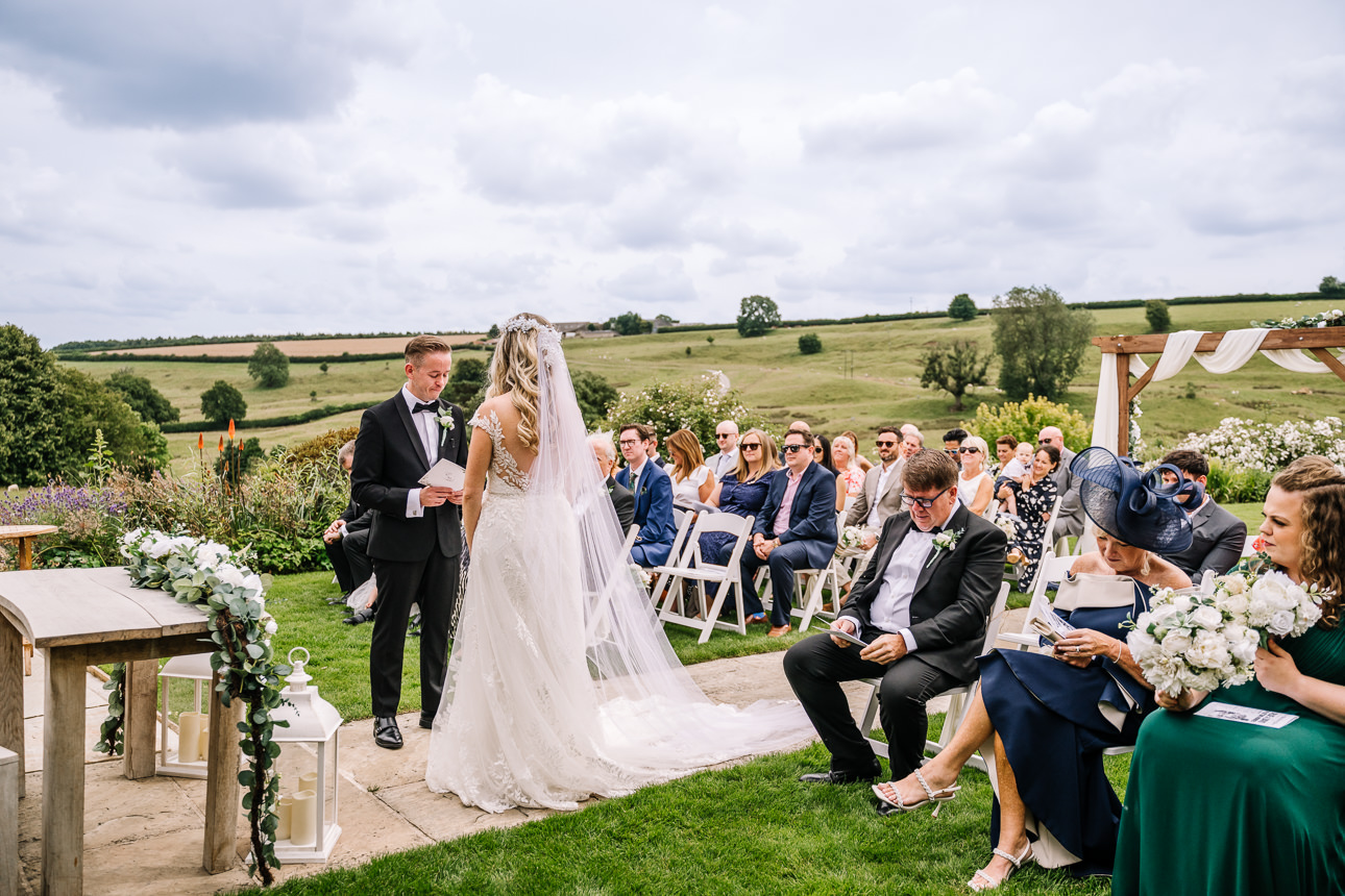 Kingscote Barn outdoor wedding ceremony