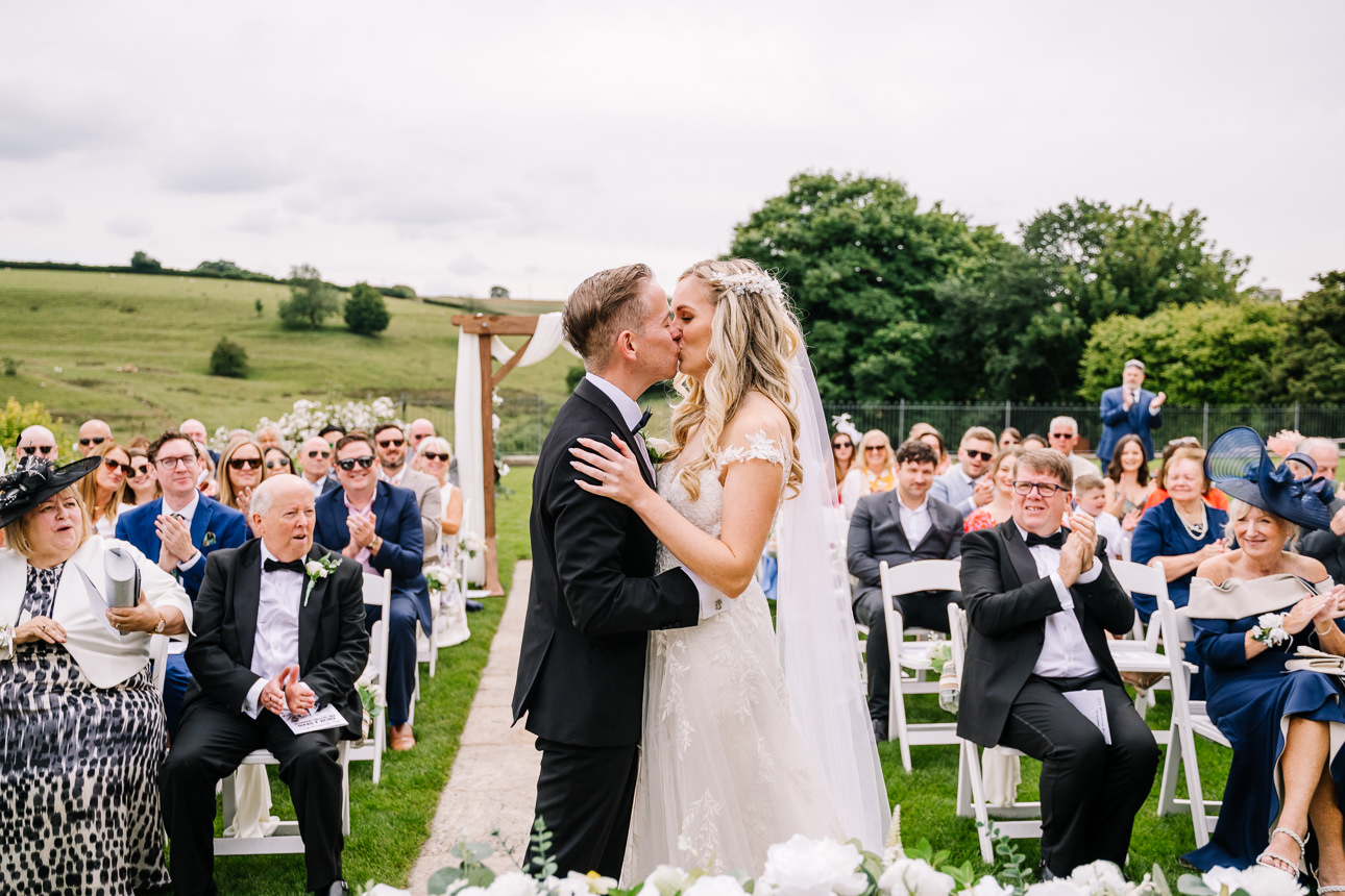 Kingscote Barn outdoor wedding ceremony