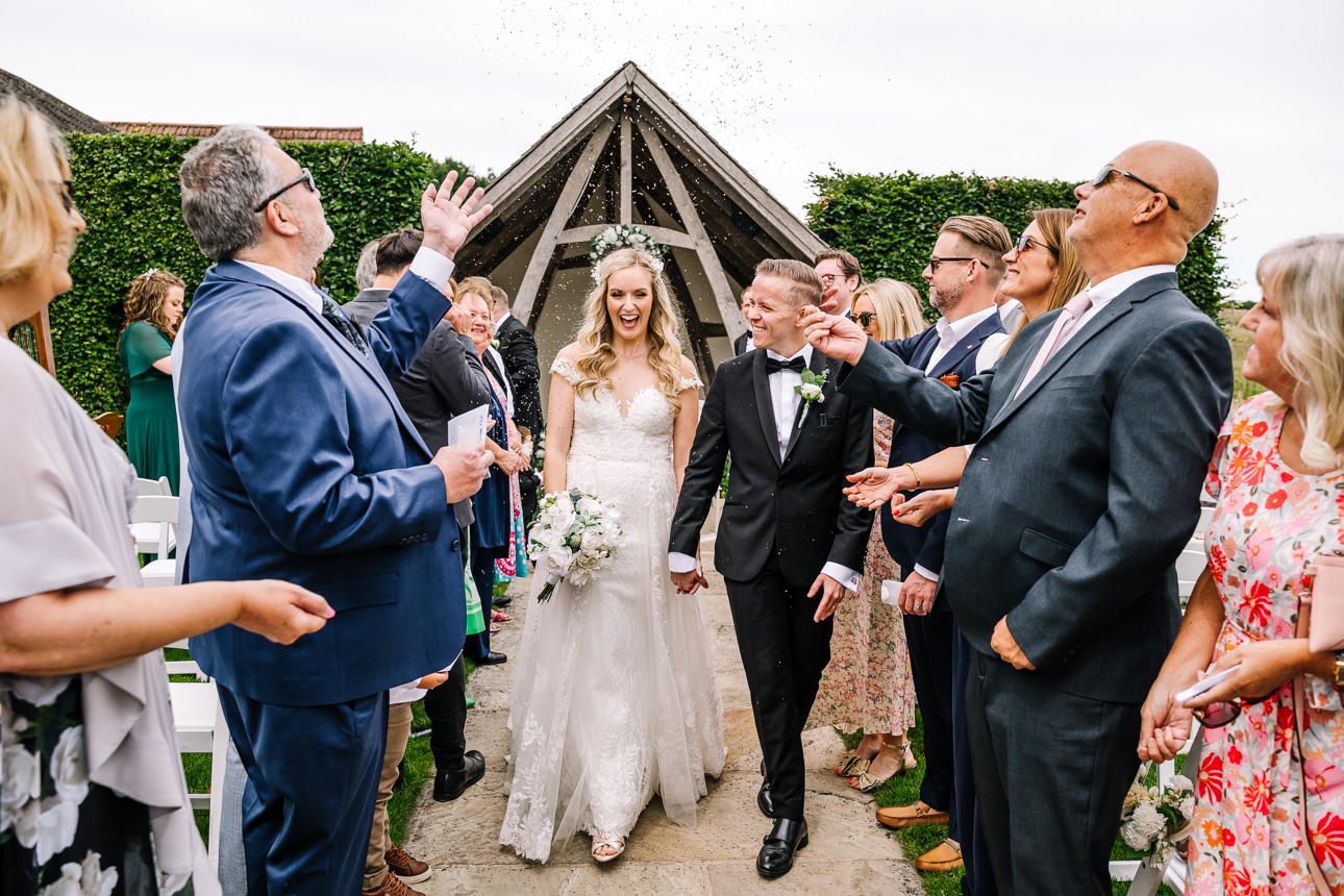 Kingscote Barn outdoor wedding ceremony