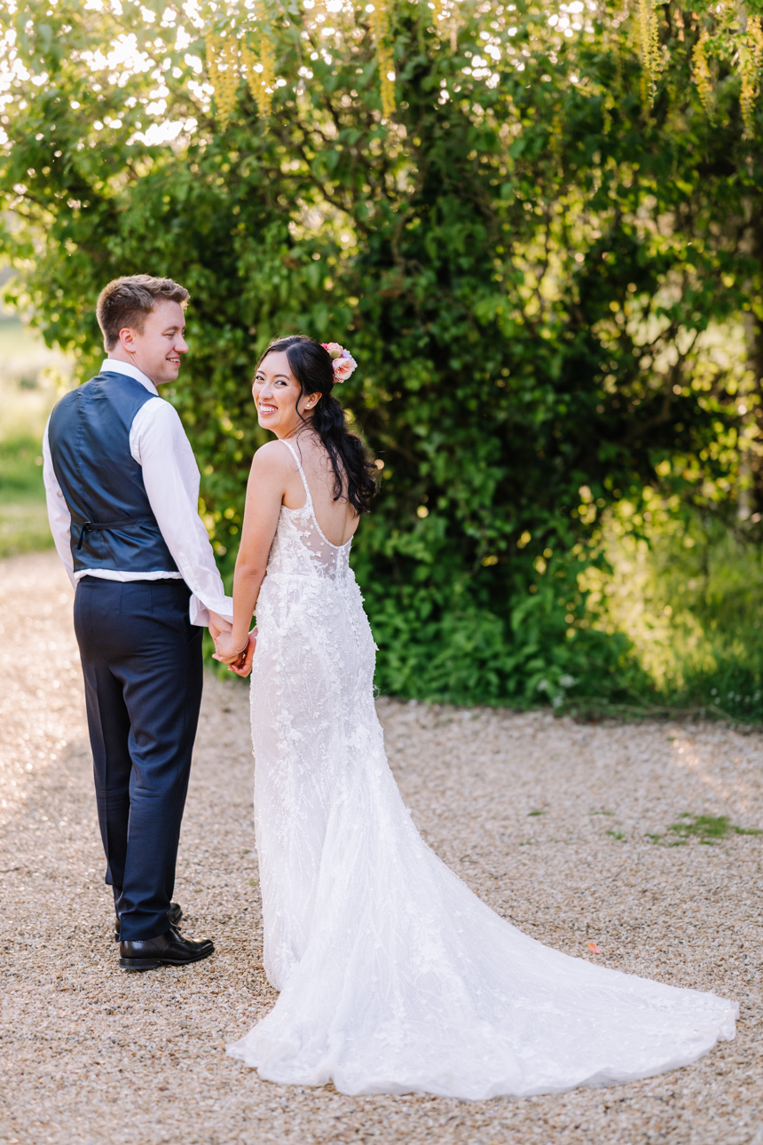LAPSTONE BARN WEDDING PHOTOGRAPHER 68 Romantic golden hour portrait of a bride and groom embracing in the outdoor gardens at Lapstone Barn.