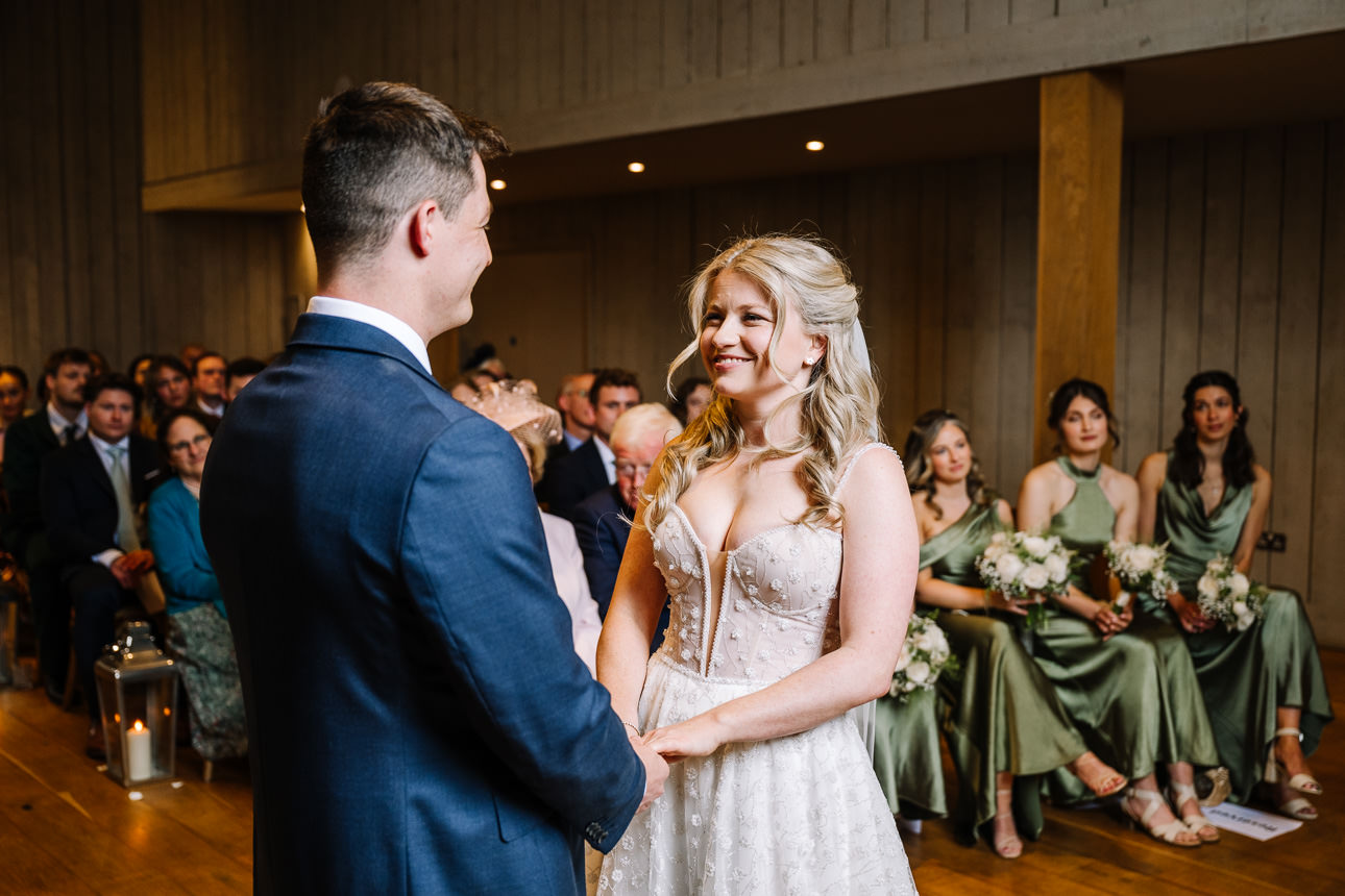 FLORA AND WILLIAM PRIMROSE HILL FARM SPRING WEDDING 28 Bride and groom sharing a moment during their wedding ceremony