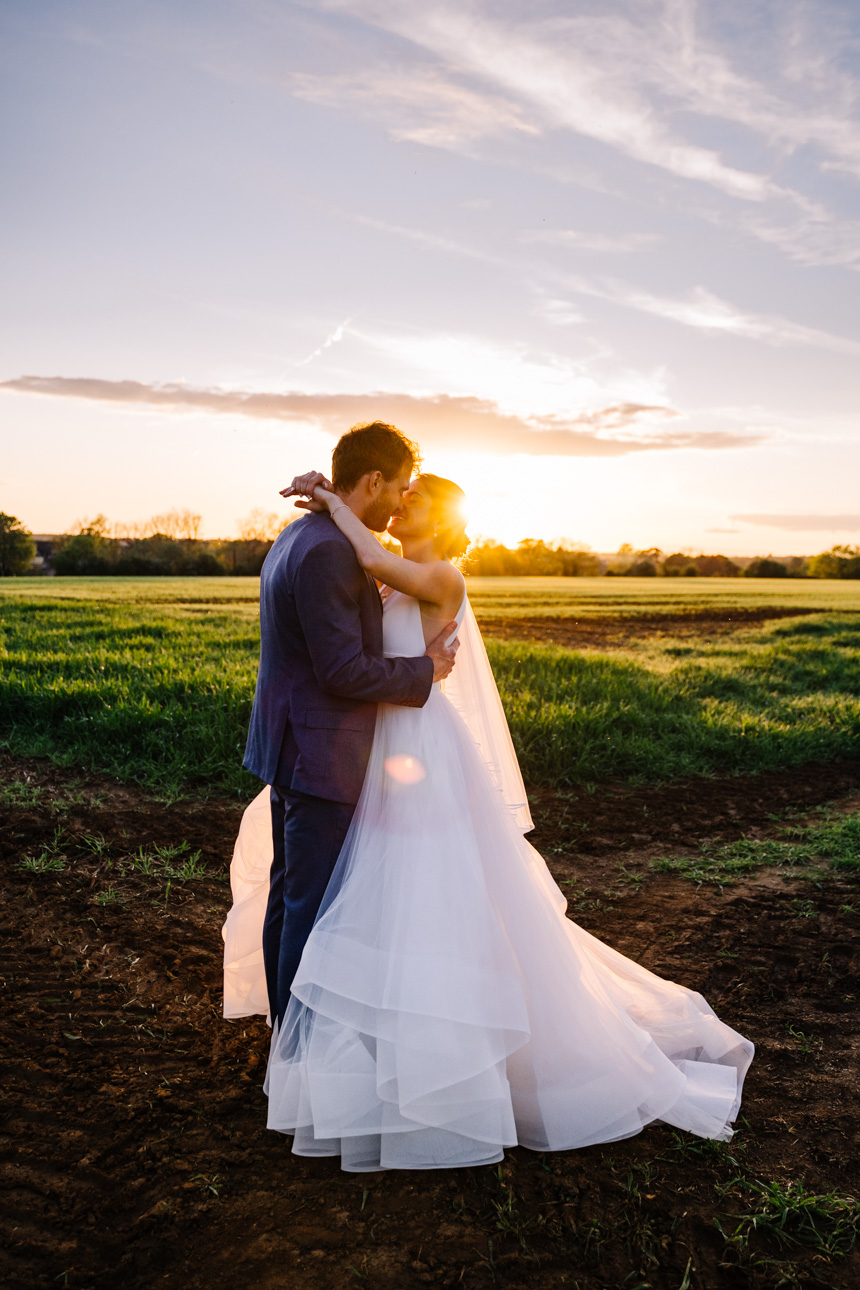 GREAT TYTHE BARN WEDDING PHOTOGRAPHER 125 Golden hour couples portrait at The Great Tythe Barn wedding venue.