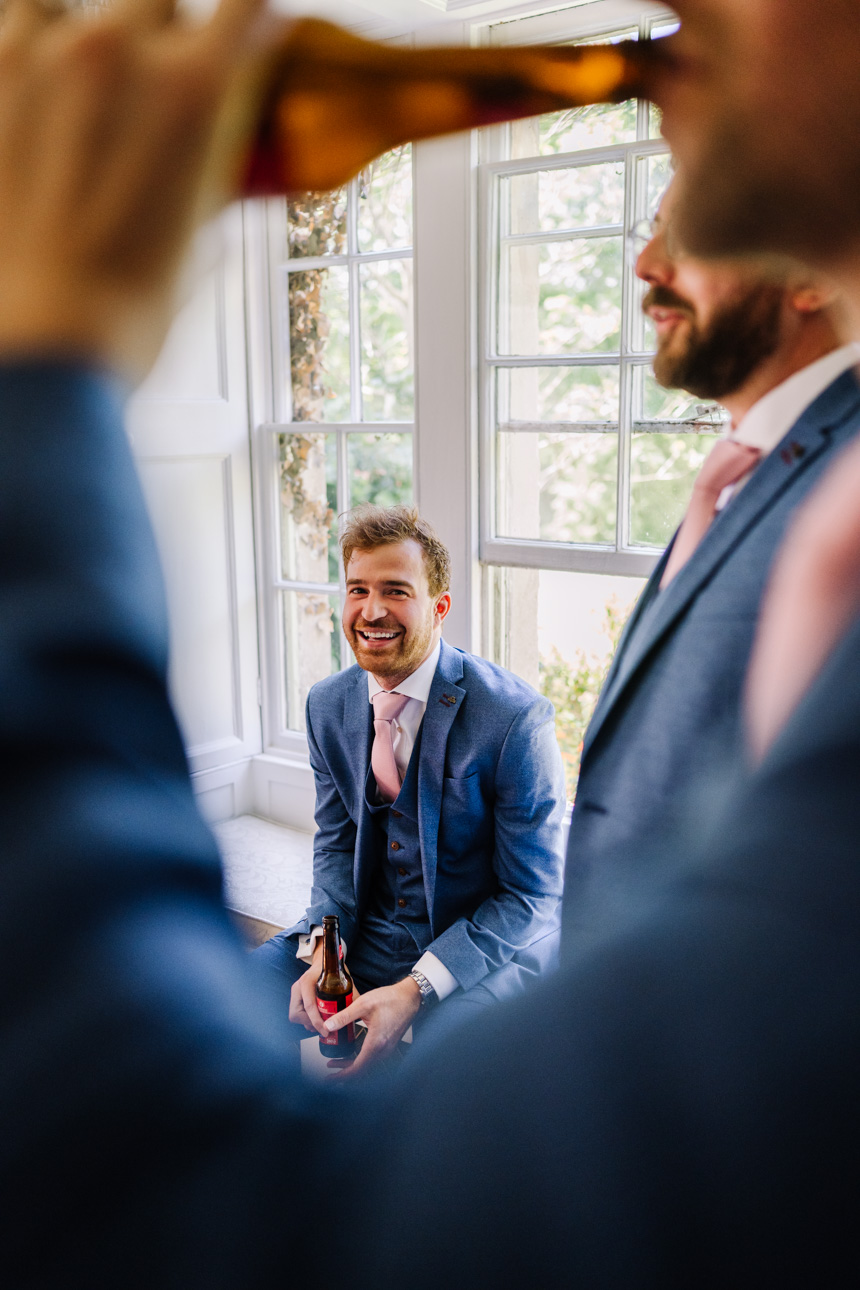 GREAT TYTHE BARN WEDDING PHOTOGRAPHER 7 Groom getting ready at the the Great Tythe Barn wedding venue.