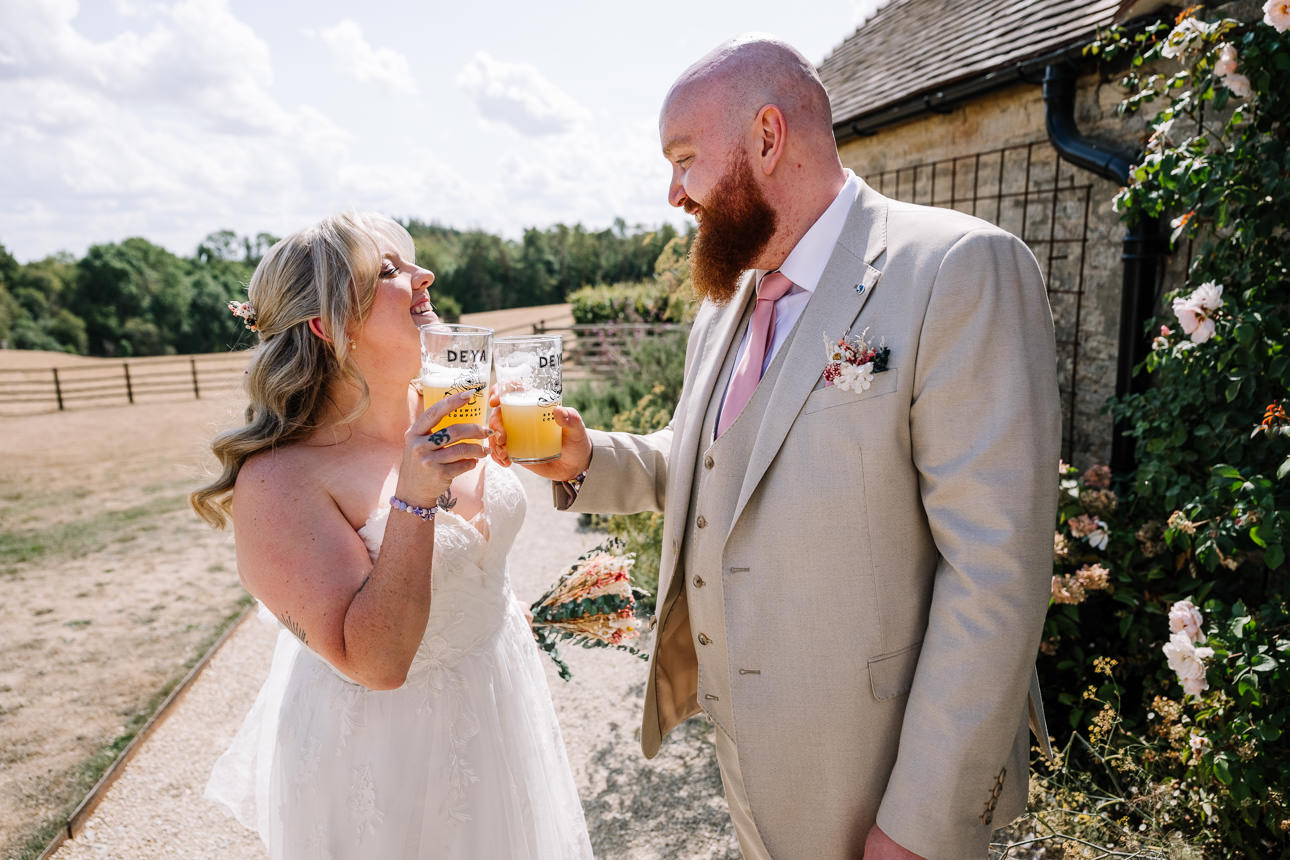 OLD GORE WEDDING PHOTOGRAPHER 48 bride and groom having a toast at old gore barn