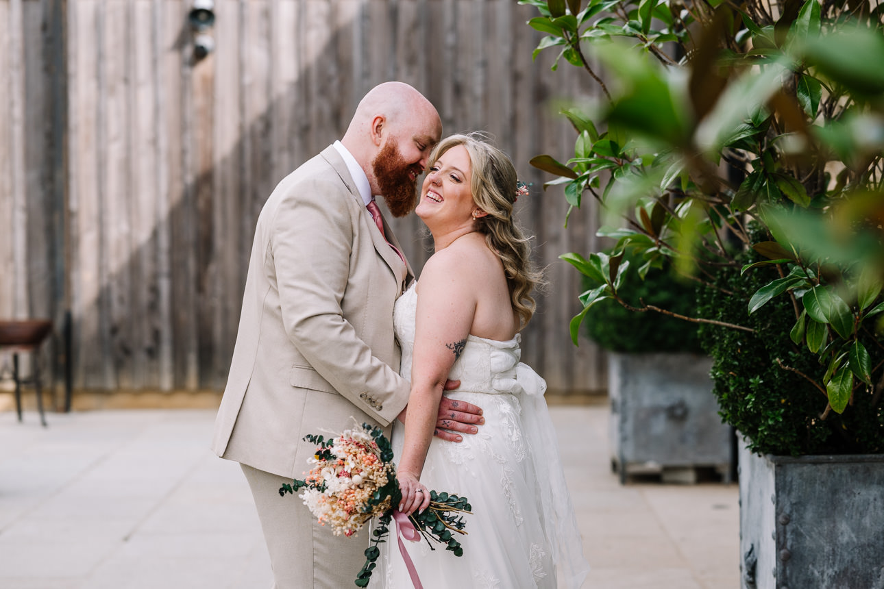 OLD GORE WEDDING PHOTOGRAPHER 57 couple embracing at Old Gore Barn