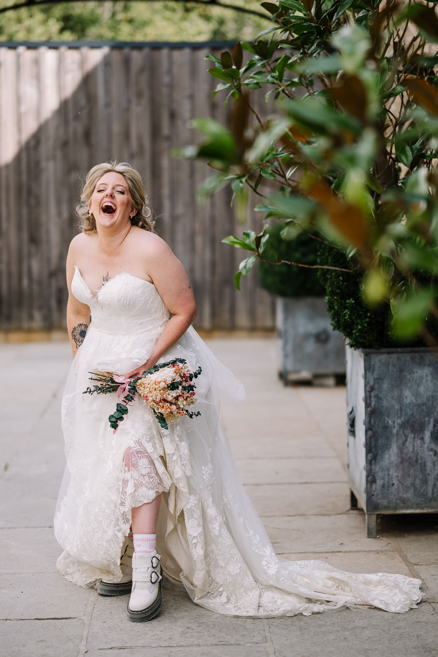 OLD GORE WEDDING PHOTOGRAPHER 59 Bride laughing at old gore Barn