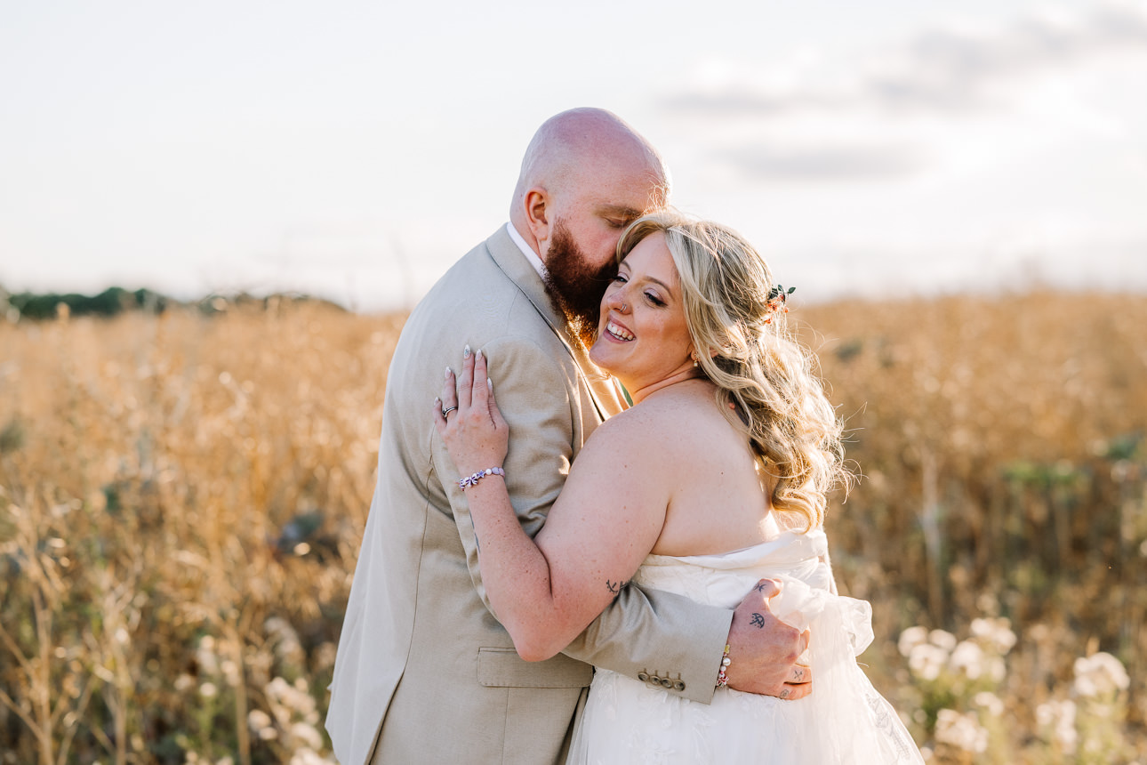 OLD GORE WEDDING PHOTOGRAPHER 54 Intimate embrace during golden hour at Old Gore Barn