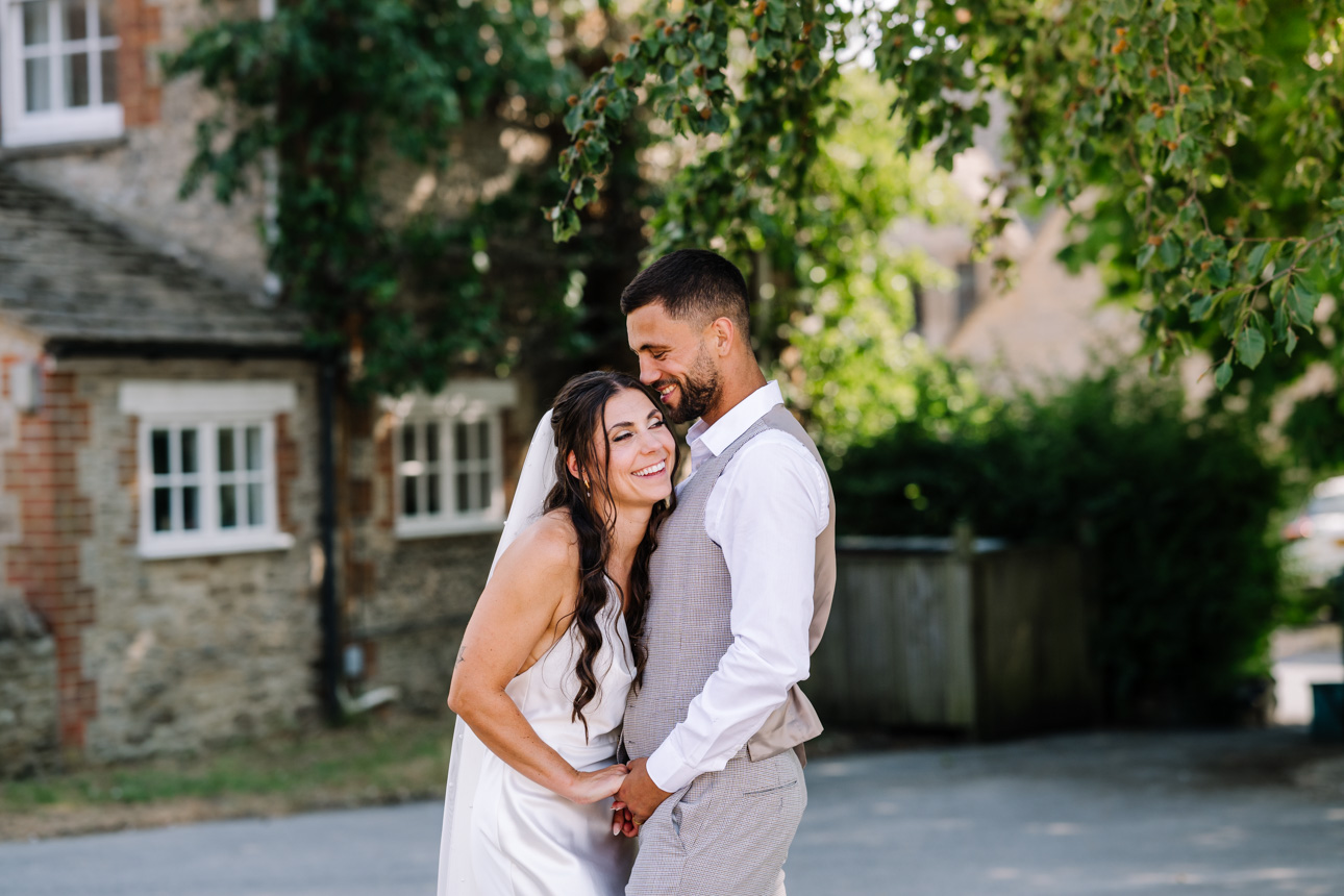 REVIEWS 70 couple in an intimate embrace after just getting married